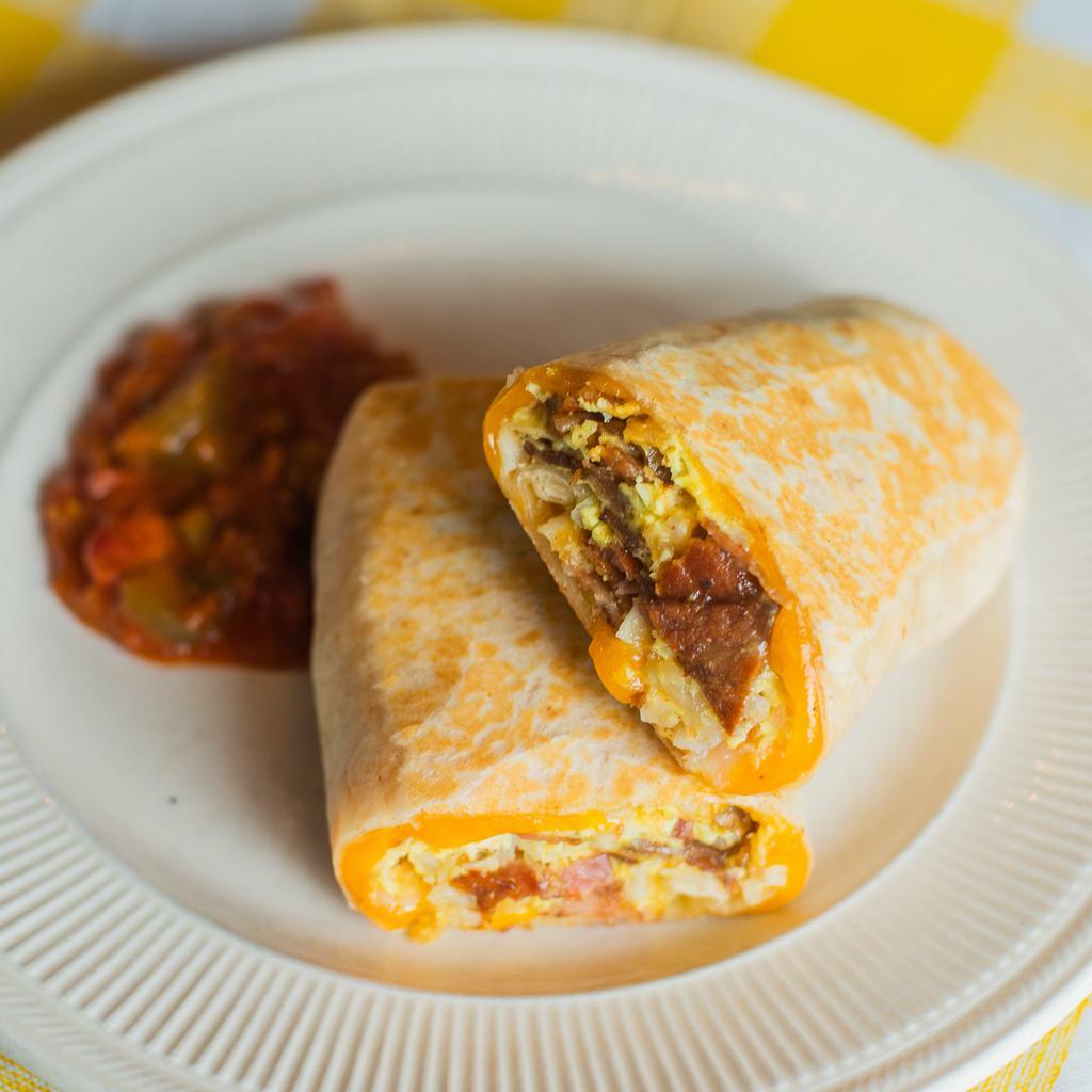 Bacon Breakfast Burrito · Scrambled eggs, bacon, tater tots, and cheddar cheese wrapped in a flour tortilla. Served with a side of salsa.