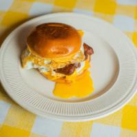 Sausage, Egg & Cheese!  · Toasted brioche bun with two Eggs, Sausage and American Cheese.
