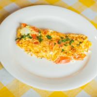 The Greek Omelet · 3 eggs, Tomatoes, Feta and Onions.

