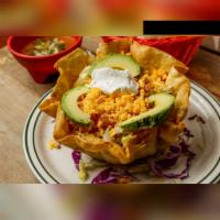 Taco Salad · Taco shell filled with your choice of ground beef or shredded, lettuce, tomatoes, cheese, so...