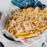 Crab Meat Fries · Maryland Blue Crab meat on top of French fries, served with remoulade sauce