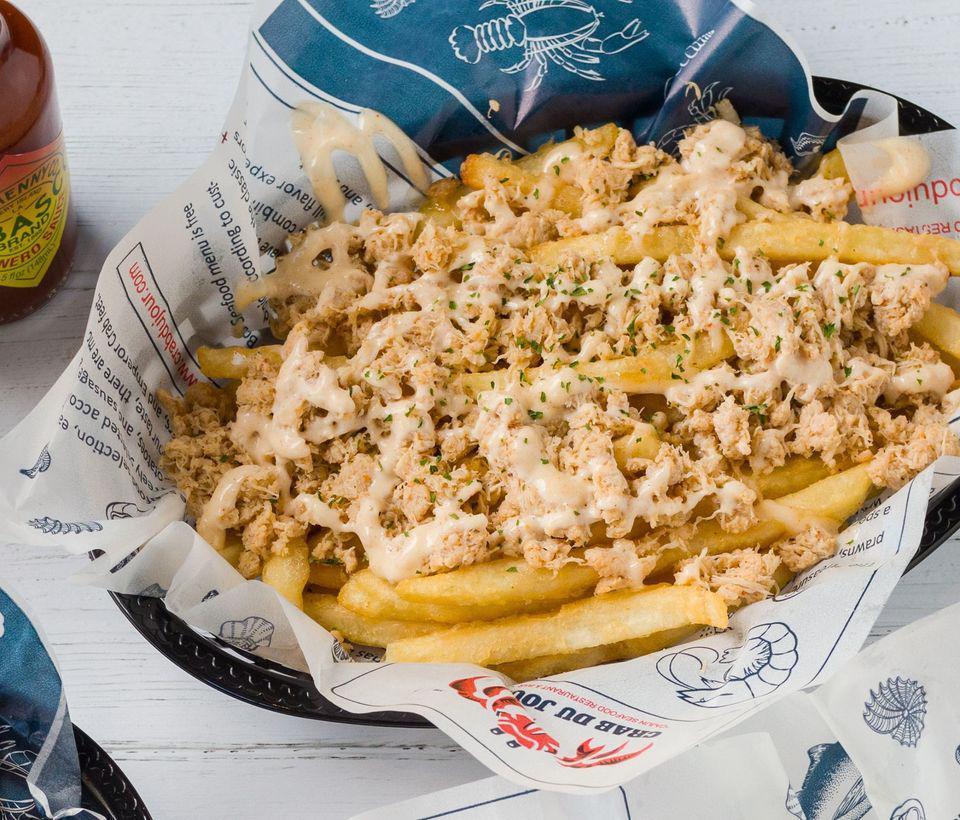 Crab Meat Fries · Maryland Blue Crab meat on top of French fries, served with remoulade sauce