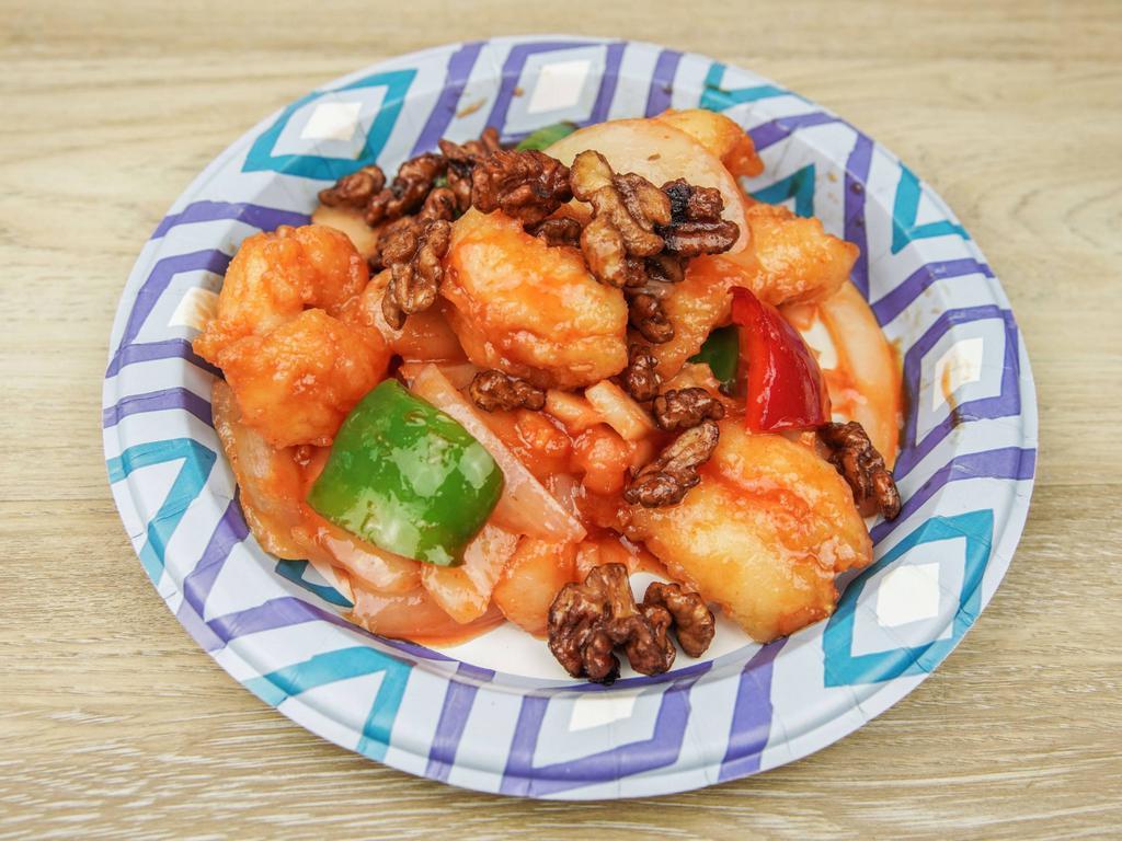 Crispy Prawn with Honey Walnuts · Fresh water chestnuts, red pepper and snow peas in chef's special sauce.