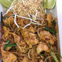Pad Thai Noodles · Rice noodles stir-fried with eggs, green onions, bean sprouts, topped with crushed peanuts, ...