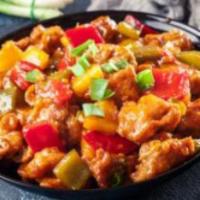 Sweet and Sour Chicken · Lightly battered fried chicken with bell peppers, onions, carrots, and pineapple in a homema...