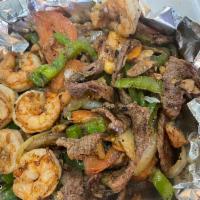 Mixed Fajita · Mix With All Three Options Chicken , Steak, & 6 Shrimp Grilled Peppers, Onions, & Tomato's W...