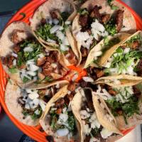 Street Taco  · With onion and cilantro. With The Choice Of Meats 