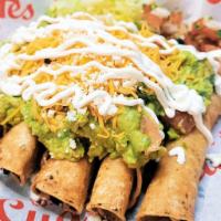 Loaded Rolled Tacos  · 5 Hand Rolled Beef Tacos Topped With Guacamole , Sour Cream, Lettuce, Pico De Gallo, & Cheese 