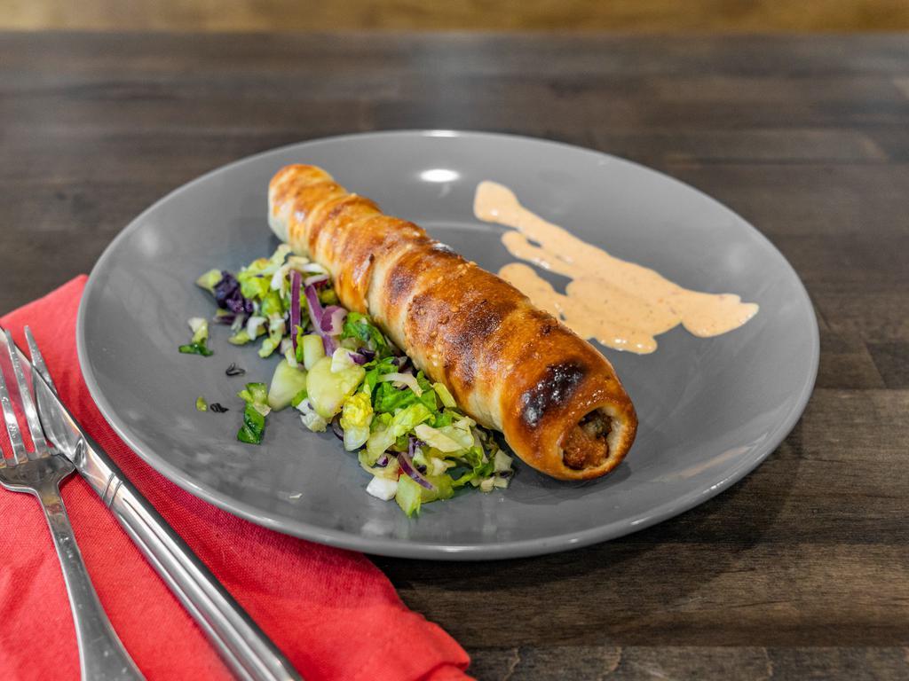 Flames Twistly Kabab Roll · 1 piece. Chicken kebab baked in naan dough with sesame seeds.