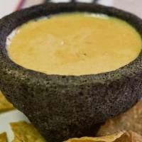 queso dip · combination of different cheeses