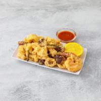 Fried Calamari · Shrimp, mushroom and zucchini and spicy tomato sauce.