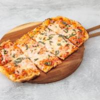 Margherita Pizza · Tomato sauce, mozzarella and fresh basil.