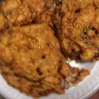 42. Chicken Egg Foo Young · Three pieces served with white rice.