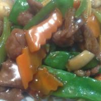 93. Beef with Oyster Sauce · Served with white rice.