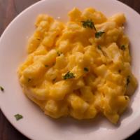 Mac and cheese · Macaroni pasta in a cheese sauce.