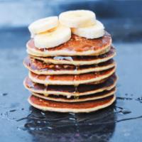 3 Pancakes with Bananas · 3 fluffy golden pancakes with bananas.