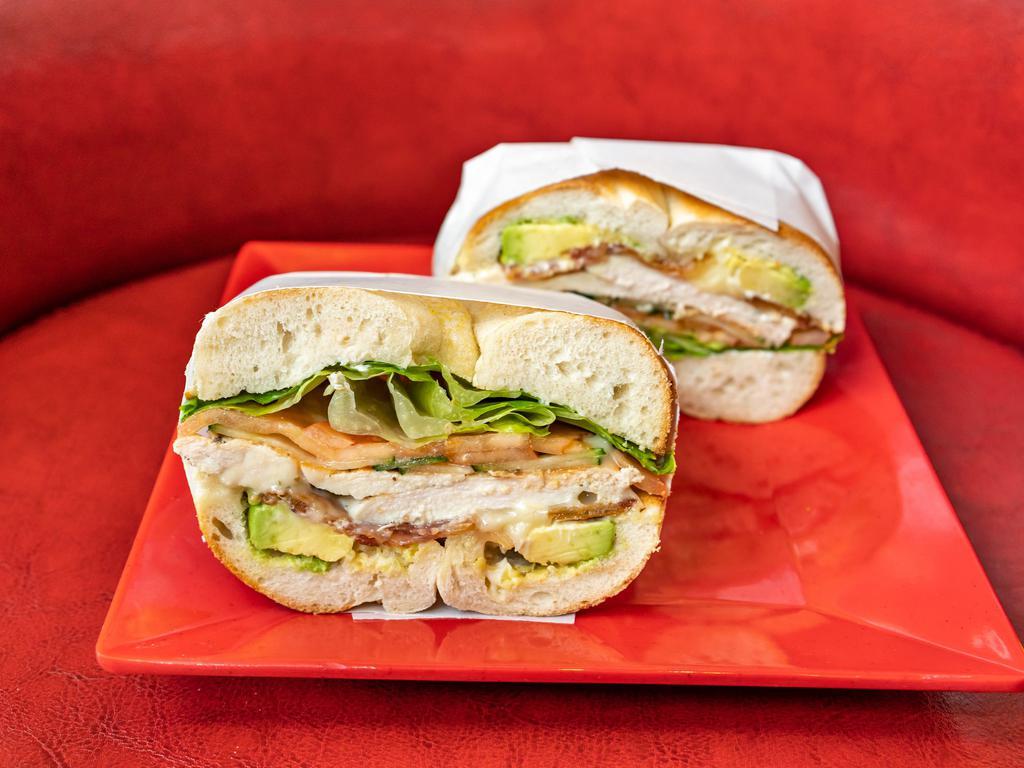 Pio Pio Sandwich · Grilled chicken, bacon, avocado, pepper jack cheese, cucumber, mayo lettuce, tomatoes, salt, and pepperona plain bagel.