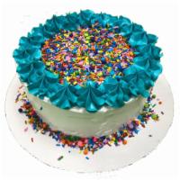 Sprinkle Cake · Serves 10-12. Two layers of Cake Batter froyo, with sprinkles as a filler, on a vanilla cake...