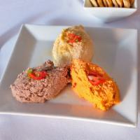 Hummus Trio · Olive, red pepper and garlic.