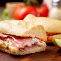 Ham and Cheese Sandwich · Ham with mozzarella cheese and our secret sauce.
