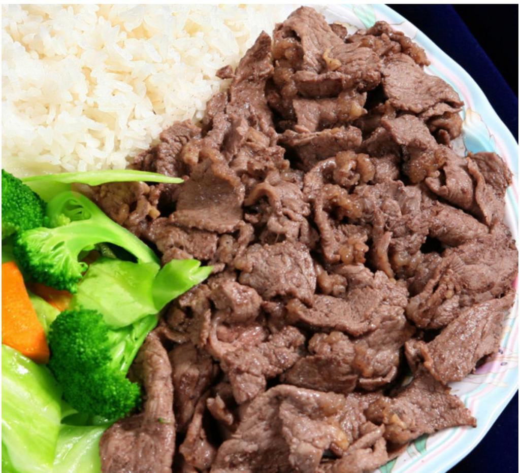 E2. Teriyaki Beef · Thinly sliced beef marinated and stir-fried in our own special sauce. Served with white rice and stir-fried vegetables (cabbage, broccoli, and carrots).