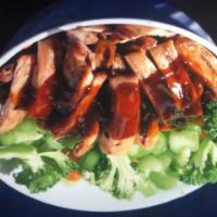 E6. Teriyaki Chicken Bowl · Boneless, skinless grilled chicken served over rice and steamed vegetables (celery, broccoli...