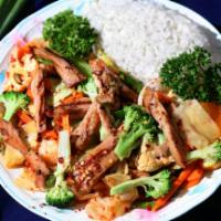 E15. Spicy Vegetable With Chicken · Vegetables and grilled chicken stir-fried in spices and our own special sauce. Served with w...