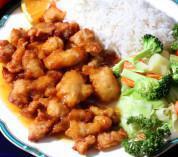 E16. Orange Chicken Plate · Lightly battered and deep fried chicken stir-fried in spices and our own special sauce. Served with white rice and stir-fried vegetables (cabbage, broccoli, and carrots).