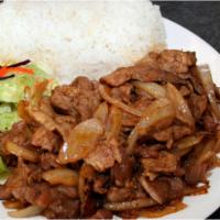 E19. Spicy Pork · Stir-fried pork marinated in our own special sauce. Served with white rice and stir-fried ve...