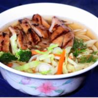 E10.  Udon Soup · Udon noodles, chicken, vegetables, and fish cake in special oriental soup. Can be made with ...