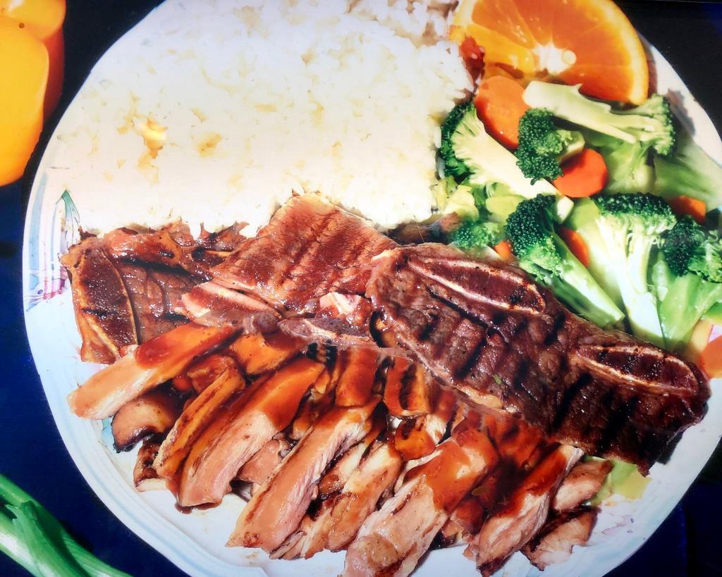C5. Teriyaki Chicken and Ribs · Boneless, skinless teriyaki grilled chicken and sliced grilled beef ribs. Served with white rice and stir-fried vegetables (cabbage, broccoli, and carrots).