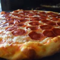Pepperoni Pizza · Top grade Italian pepperoni, mozzarella and sauce.