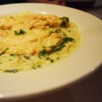 Pollo all Francese · Tender breast of chicken lightly battered and sauteed in lemon and white wine sauce with a t...