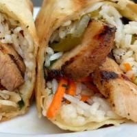 Banh Mì Burrito · Grilled lemongrass chicken, jasmine rice, pickled carrots, daikon, cilantro, jalapeno pepper...