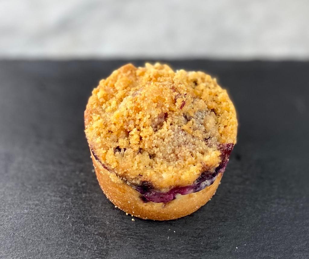 Mixed Berry Crumble · Muffin and cake hybrid with mixed red and blue berries and a crumble topping.