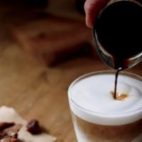 Macchiato · Fresh steamed milk with vanilla-flavored syrup marked with espresso and topped with a carame...