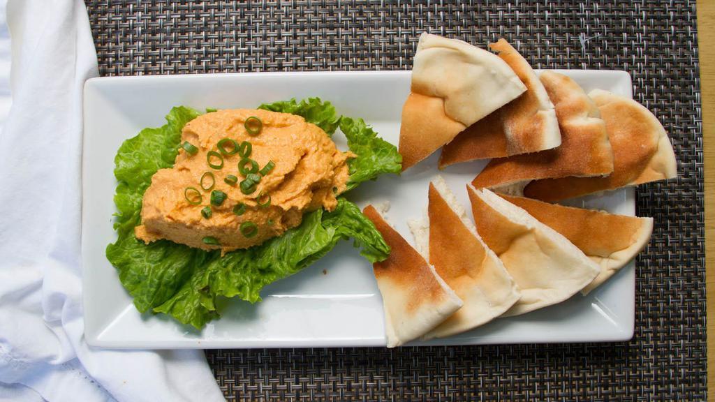 Hummus & Pita · Roasted red pepper hummus and fresh pita bread slices. Serves 2.