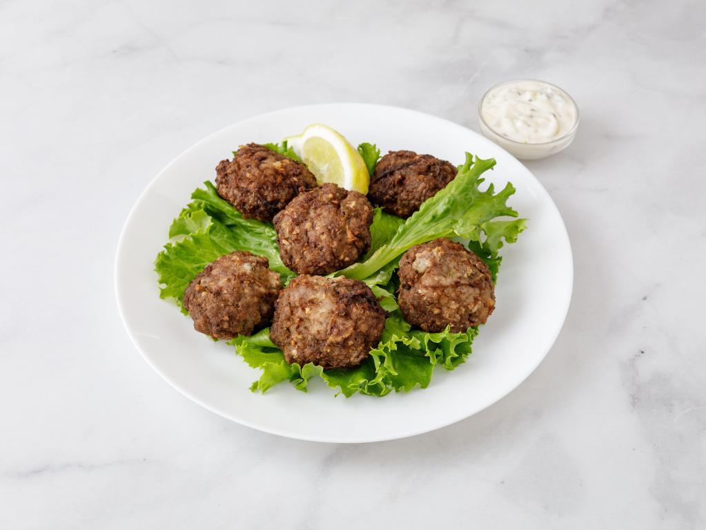 Keftedes · Greek meatballs.served with choice of rice /lemon potatoes/peas or ff