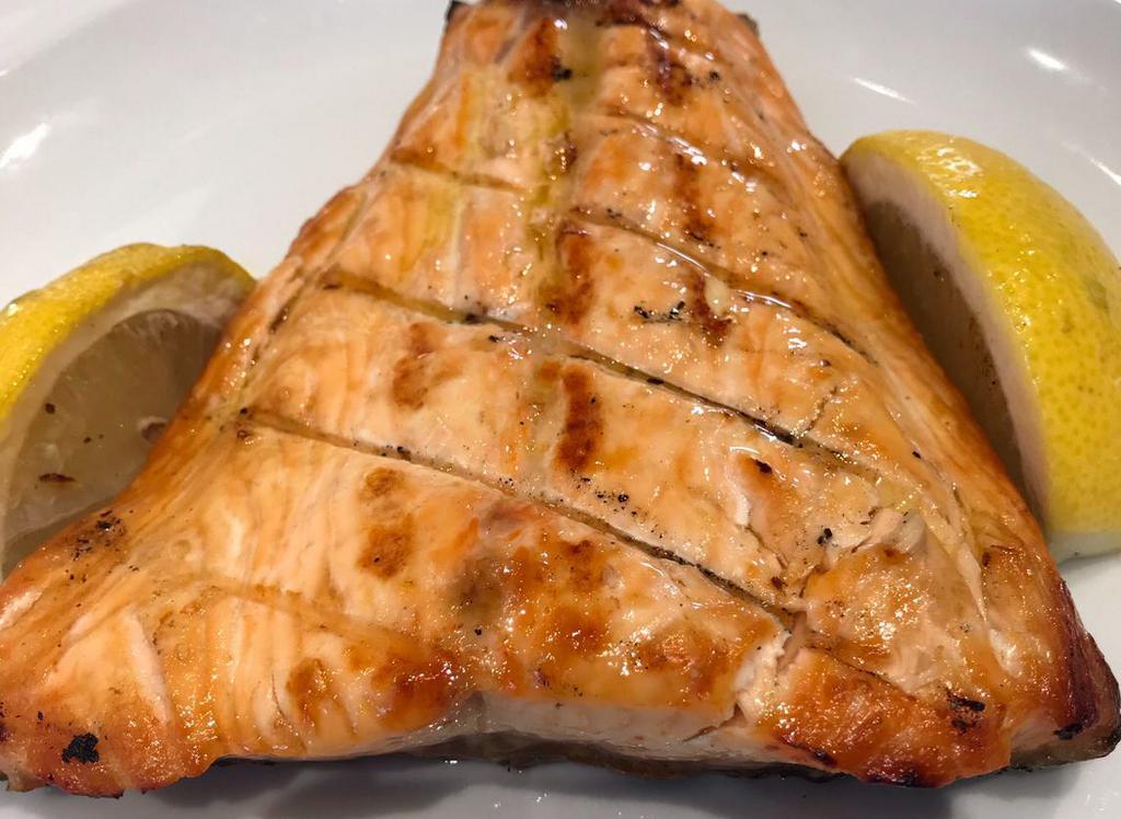 Solomos · Salmon.served with choice of lemon potatoes/peas/rice or ff