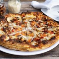 Chicken Bacon Ranch Pizza · Chicken, Bacon Pieces, Tomatoes, and Mushrooms with Mozzarella Cheese on our Buttermilk Ranc...