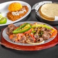 Fajitas de Steak · Mixed with red and green bell peppers with onions.