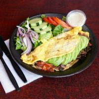 Spanish Omelet · Omelette mixed in with tomatoes, onions, mushrooms and peppers.