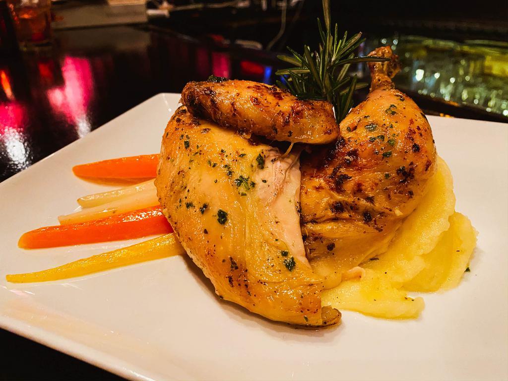 Oven Roasted Rosemary Chicken · French-cut all-natural Joyce Farms chicken breast, rosemary gravy, Yukon Gold mashed potatoes, and rainbow carrots.