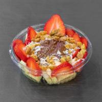 The Berry Nutelly Bowl · Strawberries & bananas sliced up around a scoop of Nutella topped with granola, walnuts & co...