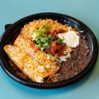 Enchilada Platter · 2 enchiladas or 1 enchilada and 1 taco. Includes rice, refried beans, lettuce, pico, sour cr...