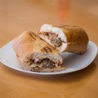 Meatball Sandwich · Homemade meatballs with marinara sauce served on hot, crunchy French bread with creamy garli...