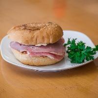 Muffaletta Sandwich · Ham, salami, mortadella, provolone cheese, and olive salad mixed with extra virgin olive oil...