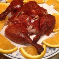 516. Boneless Peking Duck · Long Island duck, processed in truly Peking manner. The skin peeled and served with 12 panca...