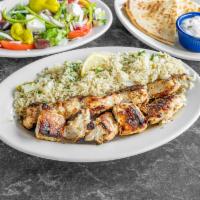 Chicken Kabob Plate · Served with a side salad, one pita bread, one small tzatziki also your choice of lemon potat...