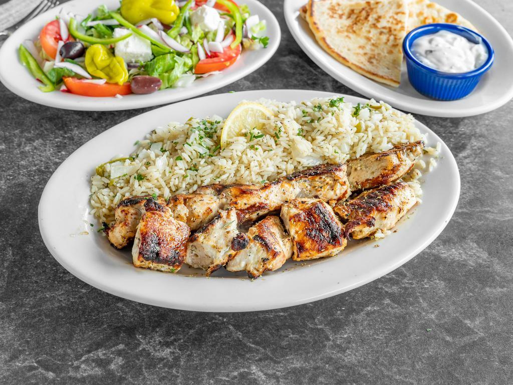 Chicken Kabob Plate · Served with a side salad, one pita bread, one small tzatziki also your choice of lemon potatoes, rice, fries, or peas w carrots. 